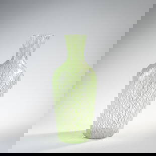 Dino Martens, 'Zanfirico a trina' vase, c. 1958: Model no. 6724. H. 28 cm. Execution: Aureliano Toso. Ribbons made of colorless glass with green spiral thread. Literature: Marc Heiremans, Dino Martens, Stuttgart 1999, p. 134; Marc Heiremans, Aureli