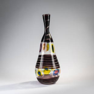 Anzolo Fuga, 'Murrine incatenate' vase, c. 1959: Model no. 14341. H. 44 cm. Execution: A.Ve.M. Glass, colorless, horizontally spiraling fused ribbons of violet, multicolored murrine ribbons and white spiral threads. Marked on the bottom: 14341 (pape