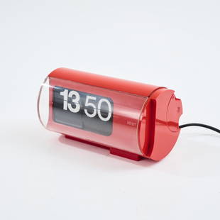 Gino Valle, 'Cifra 3' table clock, 1966: H. 10 x 18 x 9.5 cm. Made by Solari & C., Udine. Plastic, red, black and clear. Marked: solari, manufacturer's label, Solari & C. (...) serial no. 55067.