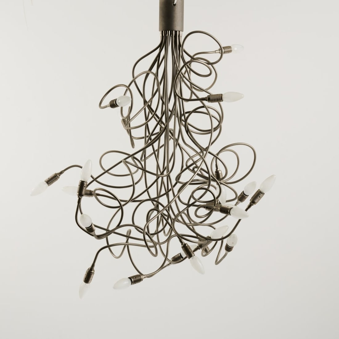 Enzo Catellani, 'Turciu 21' ceiling light, c. 1989: Arms: L. 100 - 160 cm. Made by Catellani & Smith, Milan. Sheet metal, metal flex arms, nickel-plated.