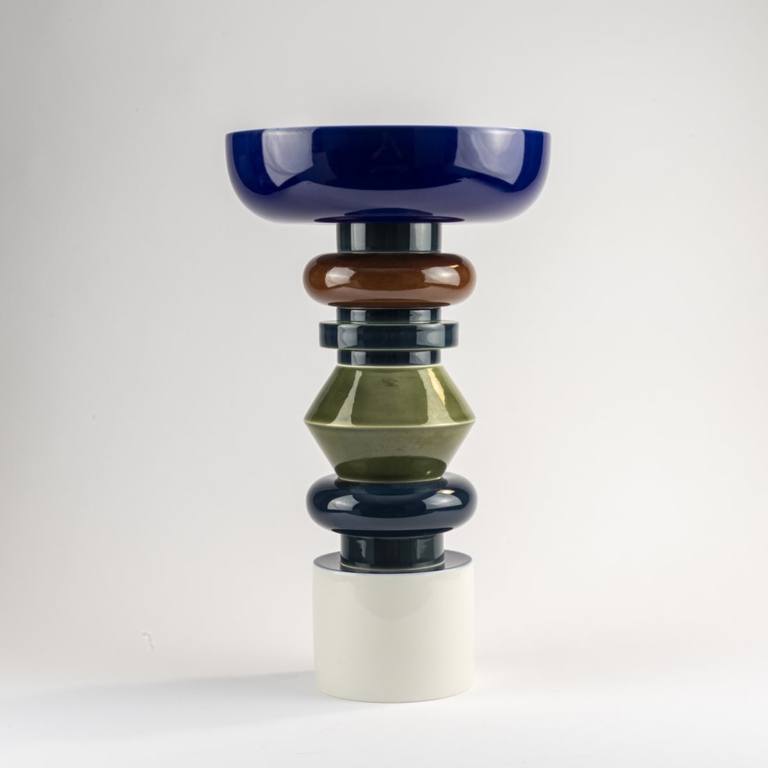 Ettore Sottsass, 'Esmeralda' centerpiece, 1994: H. 48.5 cm. Made by Manufacture Nationale de Sevres, in 1995. Porcelain, white, glazed, blue, green and brown underglaze. Marked: manufacturer's marks, designer's facsimile signature, R (?) VI 95 PN 1