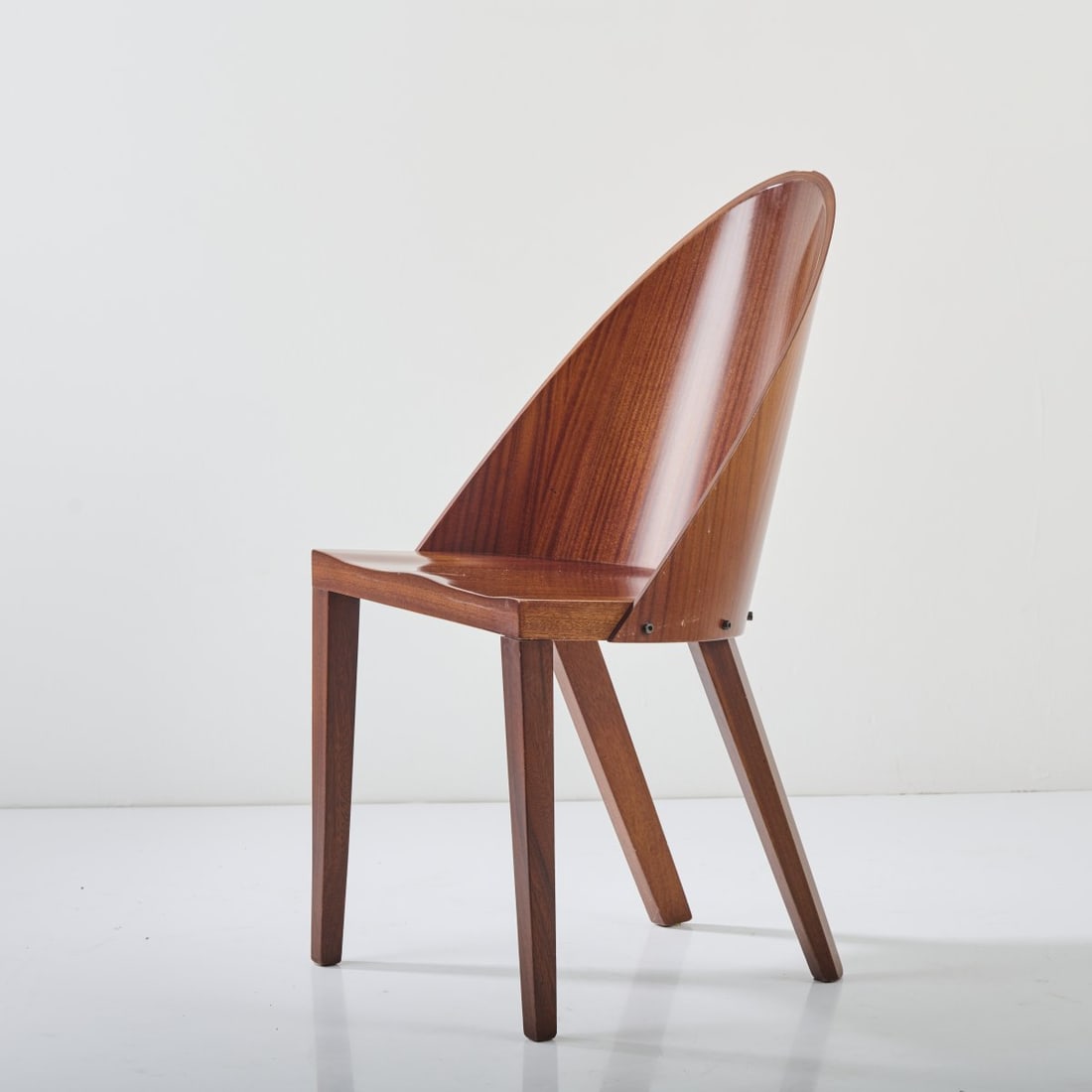 Philippe Starck, 'Royalton' - '44' chair, 1985: H. 85 x 47 x 52 cm. Made by Driade Aleph, Caorso. Wood and Plywood with mahogany veneer. Marked: manufacturer's label (1x). Literature: Brochure Driade Aleph, Caorso 1990, p. 35.