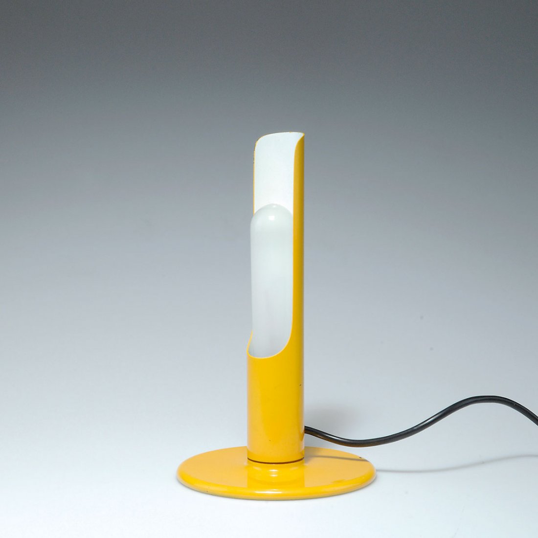 Ingo Maurer. 'Prix' table light: Ingo Maurer. 'Prix' table light, designed in 1969. H. 23.4 cm. Made by Design M Ingo Maurer Munich. Sheet metal, painted yellow and white.