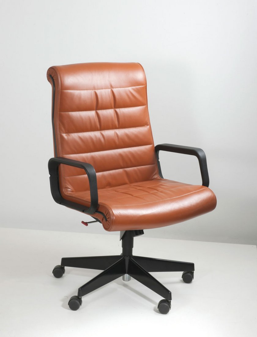 Richard Sapper. Desk chair: Richard Sapper. Desk chair, designed in 1979. H. 106 x 67.5 x 66 cm. Made by Knoll International, New York. Steel frame, cognac-brown leather, plastic armrests. Marked: Maker's label.