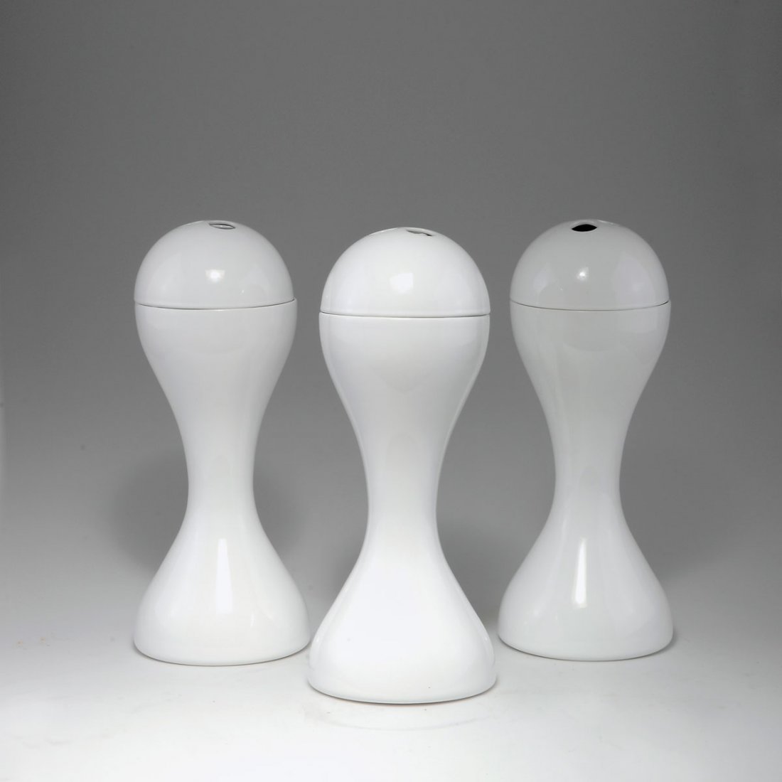 Marc Newson. Three 'PO 9369' vases: Marc Newson. Three 'PO 9369' vases, designed in 1993. H. 39.5 cm. Made by Cappellini, Milan. Porcelain, white, glazed. Marked: Maker's label.