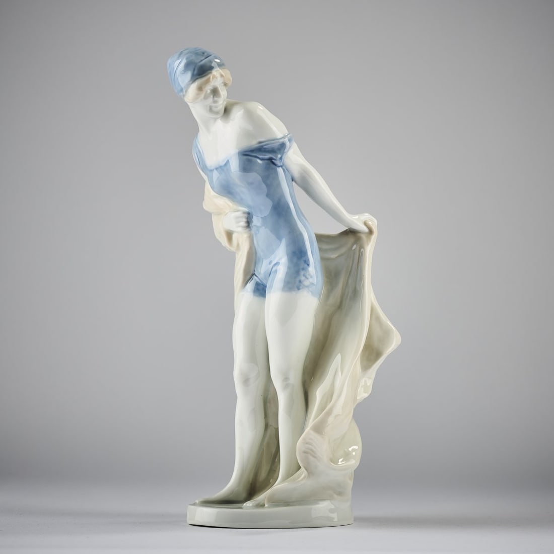 Rudolf Marcuse, 'In the Wind', 1913: H. 28 cm. Executed by Rosenthal, Selb, c. 1914. Porcelain, white, glazed, polychrome underglaze. Base signed: RUDOLF MARCUSE (brown). Marked: manufacturer's mark (green, underglaze), K 293 (embossed),