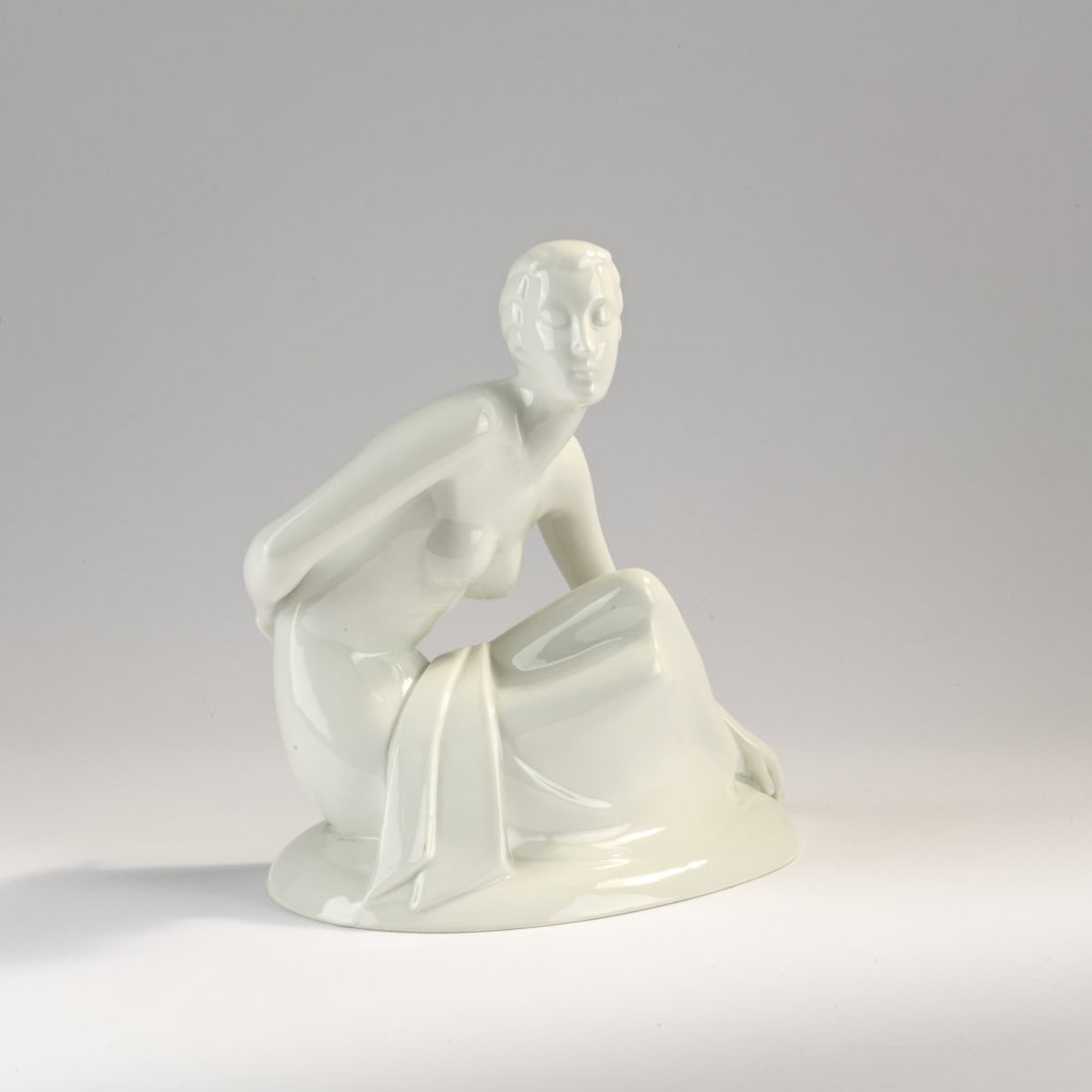 Gerhard Schliepstein, 'Bather', c. 1932: H. 22 x 23 x 15 cm. Executed by Rosenthal, Branch factory, Selb, probably 1943-48. Porcelain, white, glazed. Marked: Manufactory mark (green, under glaze), G. SCHLIEPSTEIN 715 (embossed).