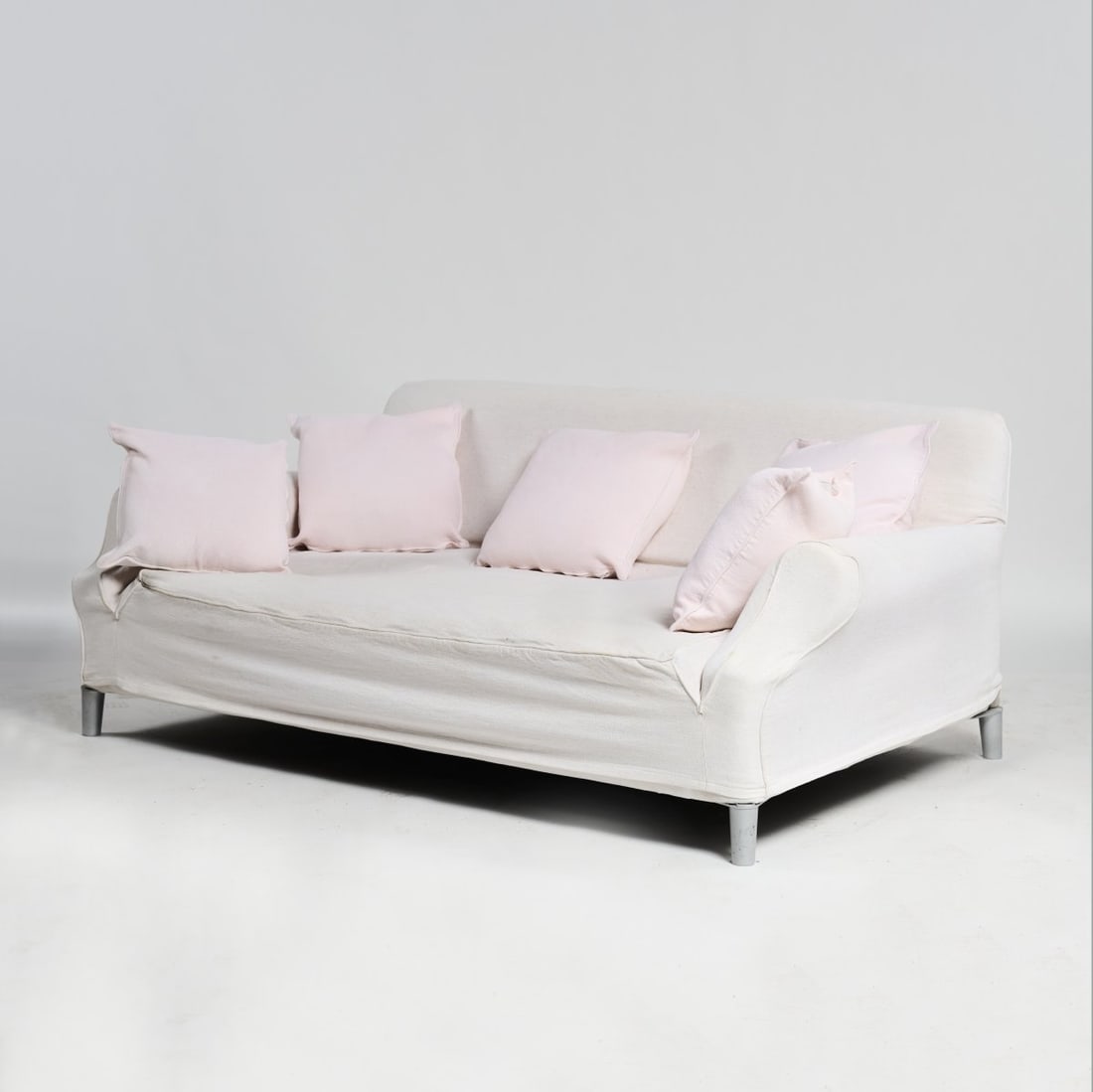 Philippe Starck, 'Lazy Working Sofa', 1998: H. 84 x 222 x 125 cm. Made by Cassina, Milan. Cast aluminum, white textile. Marked: manufacturer's label. Literature: Philippi (ed.), STARCK, Cologne 2000, p. 209 f.
