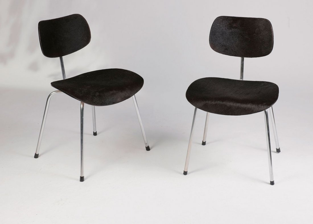 Pair of 'SE 68' chairs, 1951: Egon Eiermann. Pair of 'SE 68' chairs, 1951. H. 76.5 x 46.5 x 49 cm. Made by Wilde & Spieth, Esslingen. Chrome-plated tubular steel, plywood, painted black, black cow hide. Marked: 2.12.56.