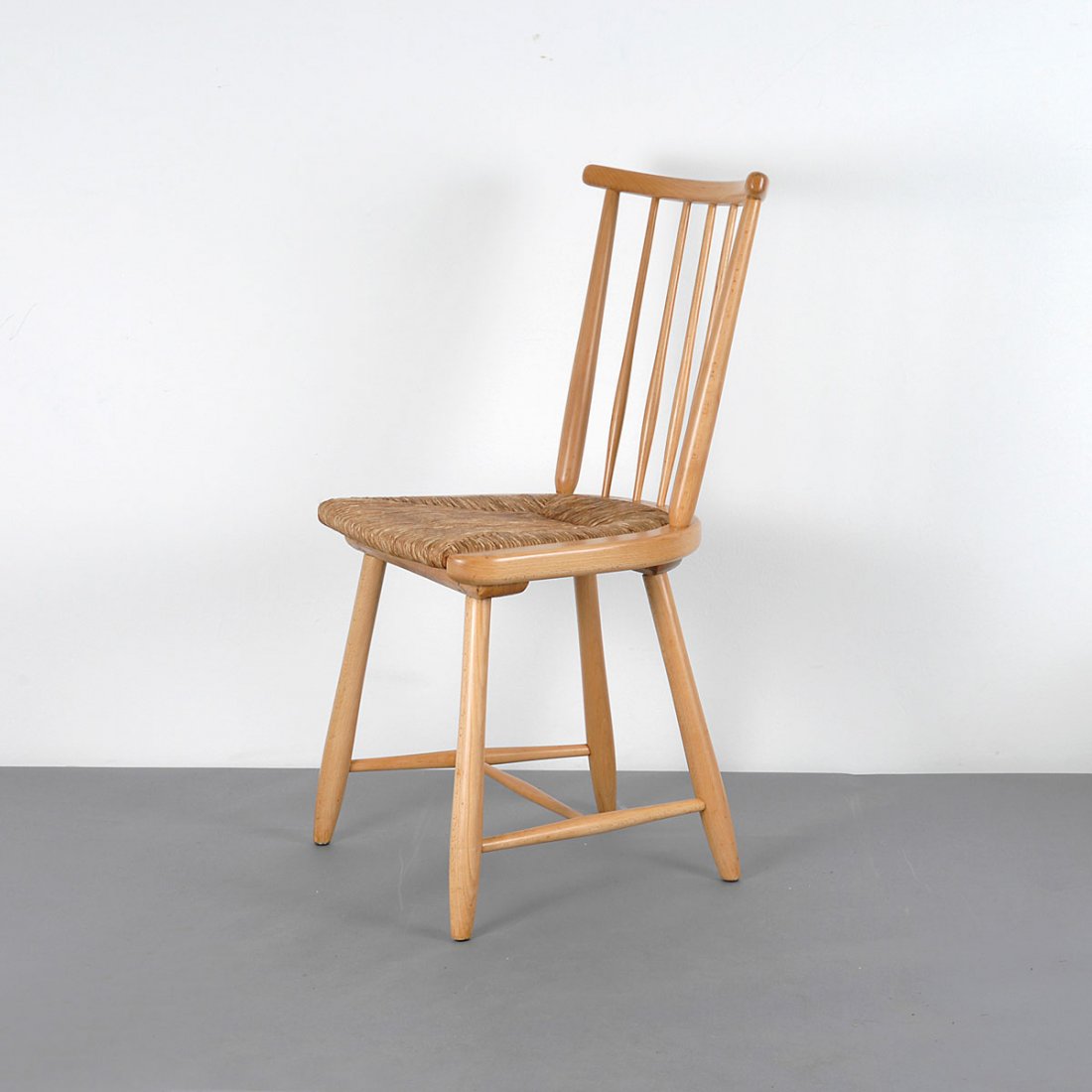 'WKS' chair, c1955: Arno Lambrecht. 'WKS' chair, c1955. H. 84.5 x 45 x 52 cm. Made by WK-Moebel, Stuttgart. Beech wood, rushwork.