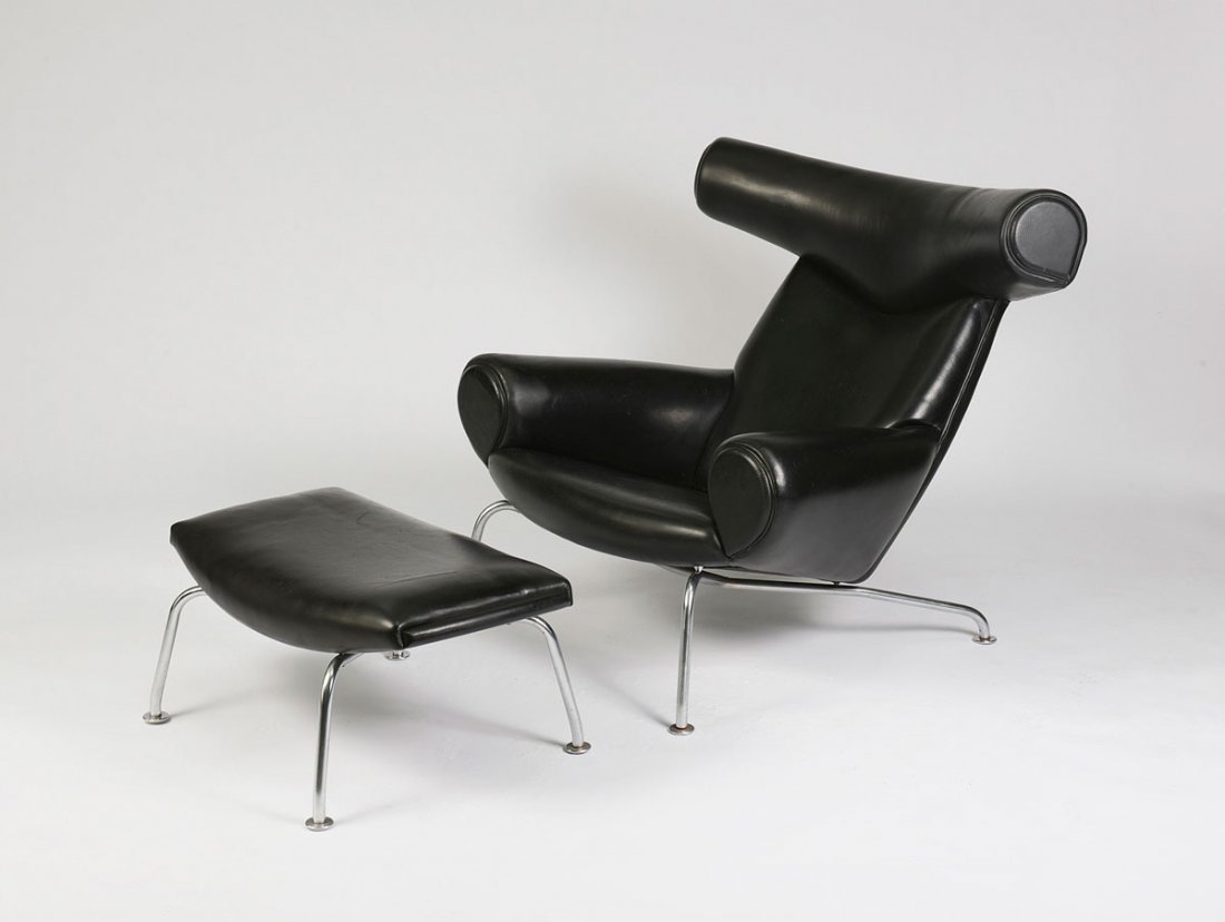 'Ox - AP46' easy chair and ottoman, 1960: Hans J. Wegner. 'Ox-AP46' easy chair and ottoman, 1960. Chair: H. 89 x 90 x 95 cm; stool: H. 33 x 74 x 54 cm. Made by AP Stolen, Copenhagen. Chrome-plated tubular steel, black leather.