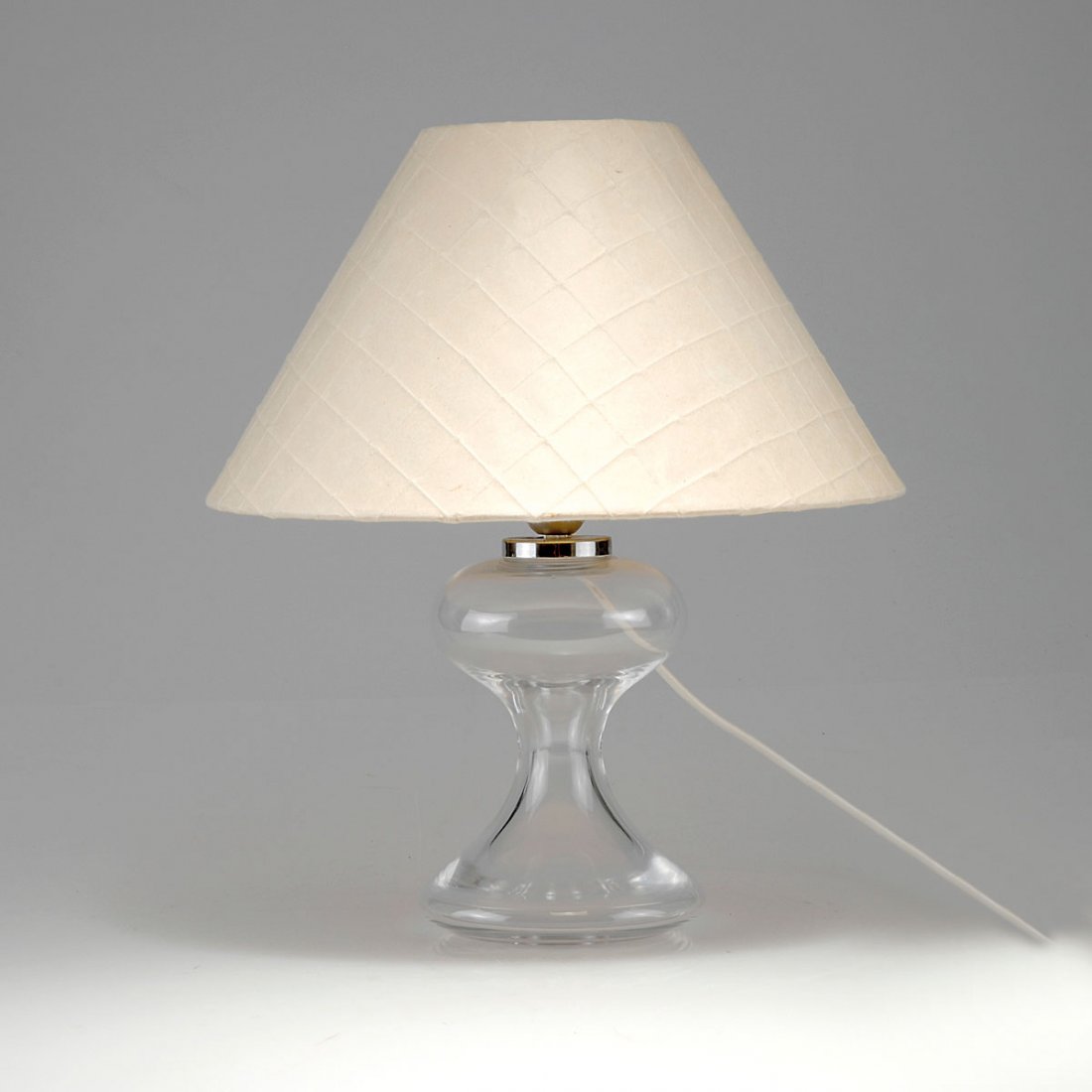 'ML 1' table light, c1967: Ingo Maurer. 'ML1' table light, c1967. H. 43 cm; D. 38.5 cm. Made by Design M, Ingo Maurer, Munich. Clear glass, metal, paper shade. Marked: Maker's label.