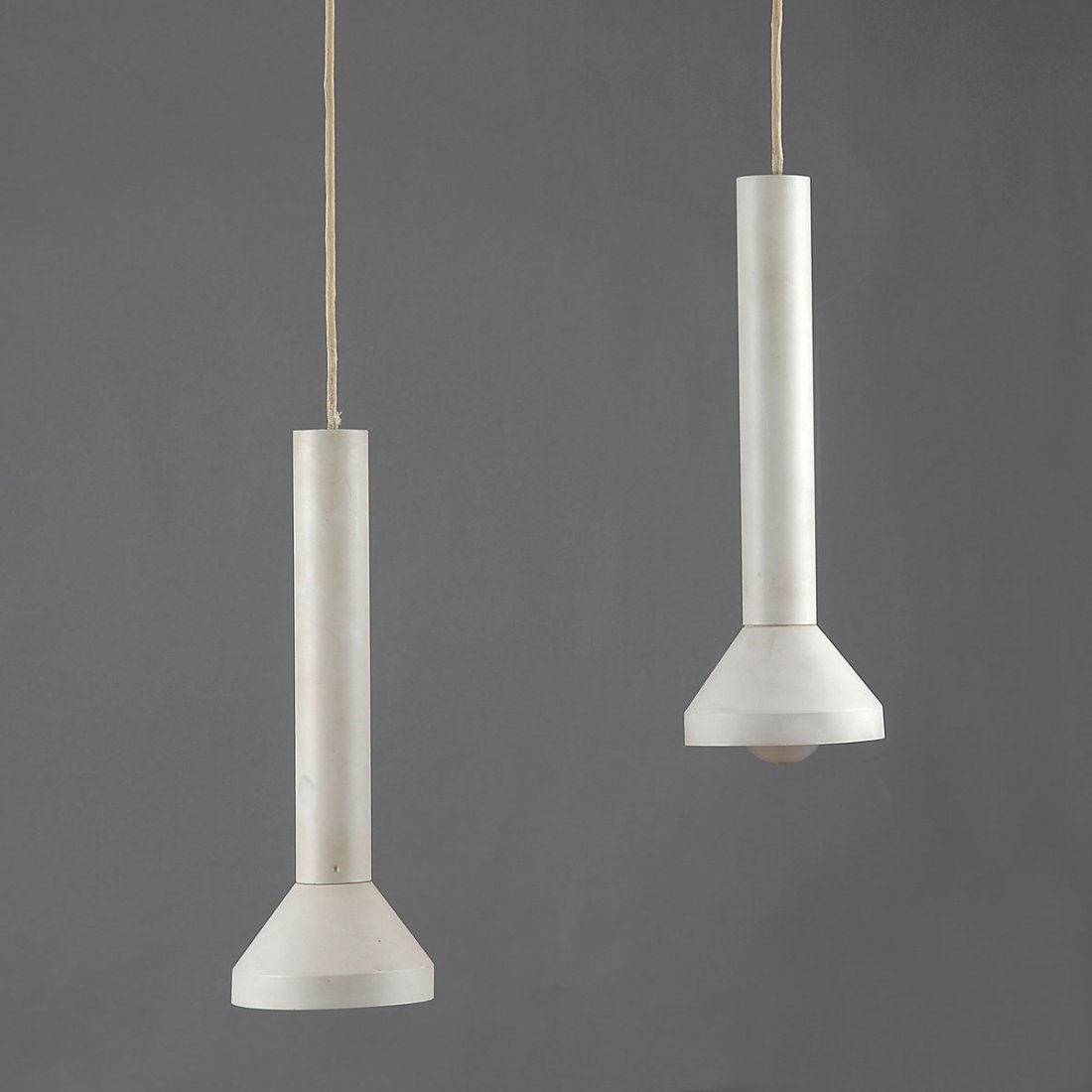 Pair of ceiling lights, c1970: Lyfa, Ballerup (attributed). Pair of ceiling lights, c1970. H. 39.3 cm; D. 14 cm. Sheet metal, painted white.
