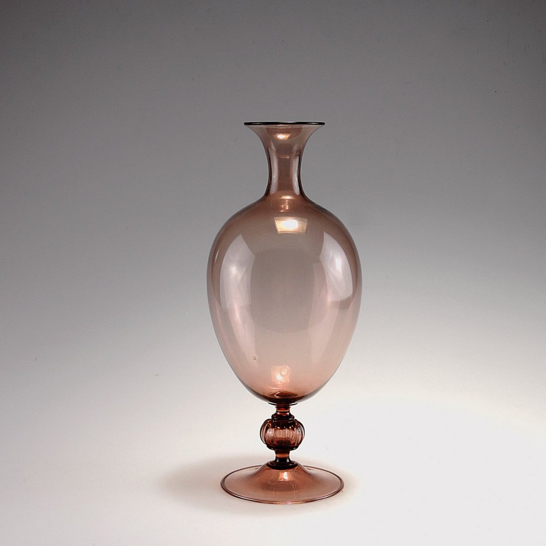 Vase 'trasparento': Vittorio Zecchin. Vase 'trasparento'. Designed in 1921-25. H. 34 cm. Made by Venini & C. Purple gass. Marked: venini murano MADE IN ITALY (acid stamp).