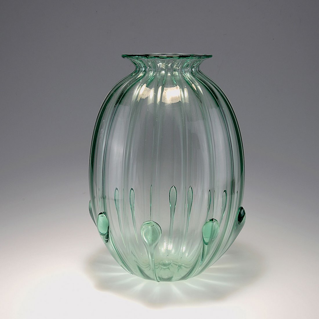 Vase 'a goccioloni': Vittorio Zecchin. Vase 'a goccioloni'. Designed in 1922-25. H. 37.7 cm. Made by Venini & C. Green coloured glass. Marked: venini murano MADE IN ITALY (acid stamp).