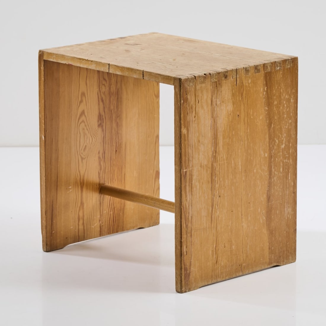 Max Bill; Hans Gugelot; Paul Hildinger, 'Ulm stool', 1953: H. 44.5 x 40 x 29.5 cm. Made at HfG, Ulm. Spruce wood, inserted and glued; beech wood handle. Literature: Rüegg (Ed.), Schweizer Möbel und Interieurs, Basel 2002, p. 367.