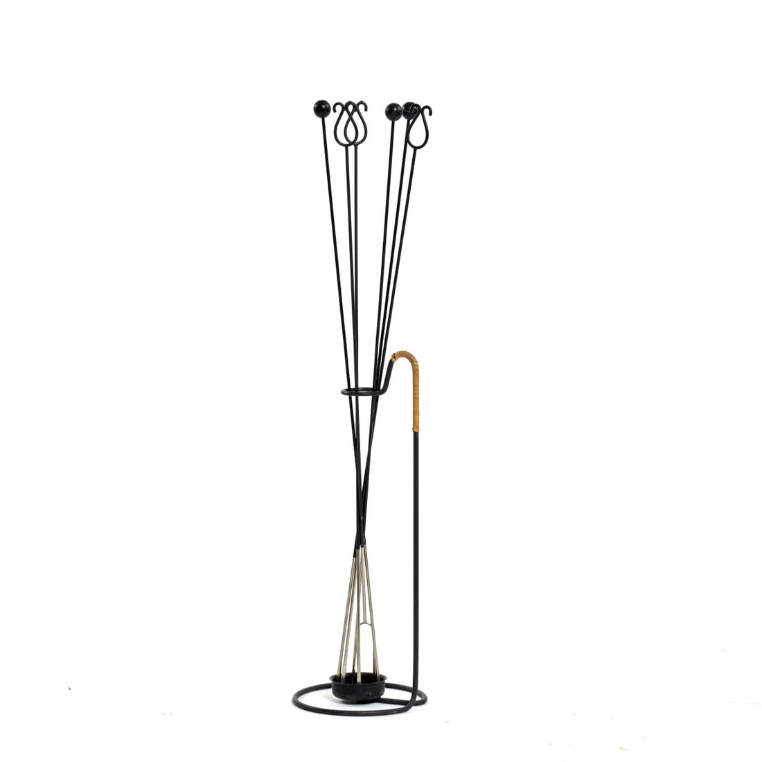Gunnar Ander, Barbecue companion, 1960s: Stand: H. 47 cm, Ø 18 cm. Skewers: L. 78.5 cm. Made by Ystad-Metall, Ystad. Metal wire, partly chrome-plated and painted black. Sheet metal, painted black, wooden balls, painted black, braid. M