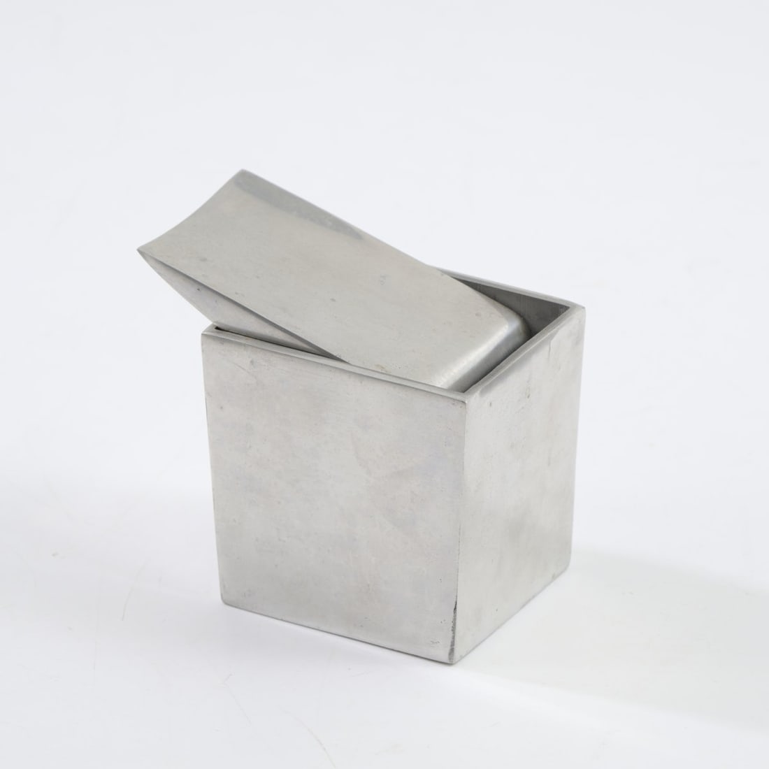 Philippe Starck, 'Ray Hollis' ashtray, 1986: H. 11 x 11.5 x 7 cm. Made by XO, Brie-Compte-Robert. Polished aluminum. Marked: facsimile signature.