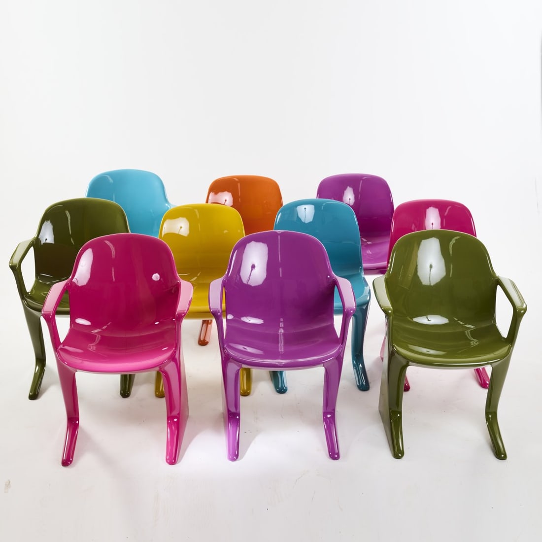 Ernst Moeckl, Ten chairs 'z.stuhl', c. 1968: H. 84 x 62/50 x 57 cm Pestel, Chemnitz, c. 2022. Plastic (polyurethane foam) in orange, green, yellow, blue, violet and pink.