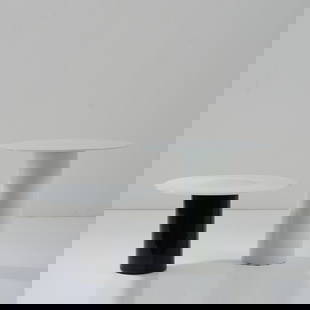 Luciano Vistosi (attr.), Two side tables, 1980s: H. 30/46 cm, Ø 49 cm. Made by Vetreria Vistosi, Murano. Glass, white and black.