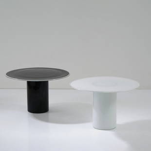 Luciano Vistosi (attr.), Two side tables, 1980s: H. 30 cm, Ø 49 cm. Made by Vetreria Vistosi, Murano. Glass, white and black. Marked: Vistosi '86 (engraved) (underside of one table).