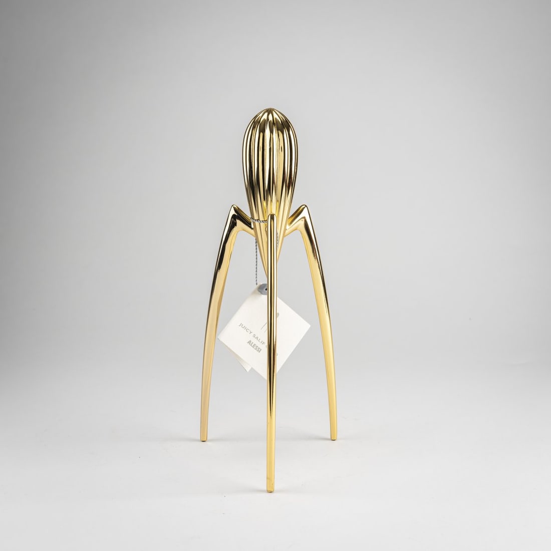 Philippe Starck, 'Juicy Salif GD' citrus juicer, 1990: H. 29.8 cm. Made by Alessi, Crusinallo. Aluminum, gold-plated. Marked: manufacturer's stamp, numbered 001678.