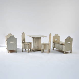 Eliel Saarinen, Two children's benches, two children's chairs and a children's table 'Munkkiniemi',: H. 63 x 67 x 37 cm; H. 73.5 x 27 x 31 cm; H. 58 x 59 x 59 cm. Pinewood, painted white.  Literature: The children's furniture was made for the Munkkiniemi School in Helsinki. Saarinen designed both, th