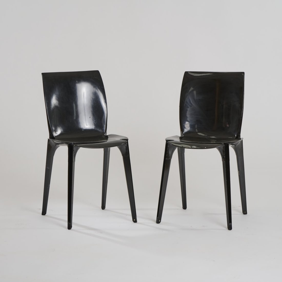Marco Zanuso and Richard Sapper, Two 'Lambda' chairs, 1963: H. 77.5 x 39.5 x 46.5 cm. Made by Gavina, Milan. Sheet metal, painted black, black rubber feet. Literature: Gramigna, Repertorio 1950-2000, vol. 1, Turin 2003, p. 100.