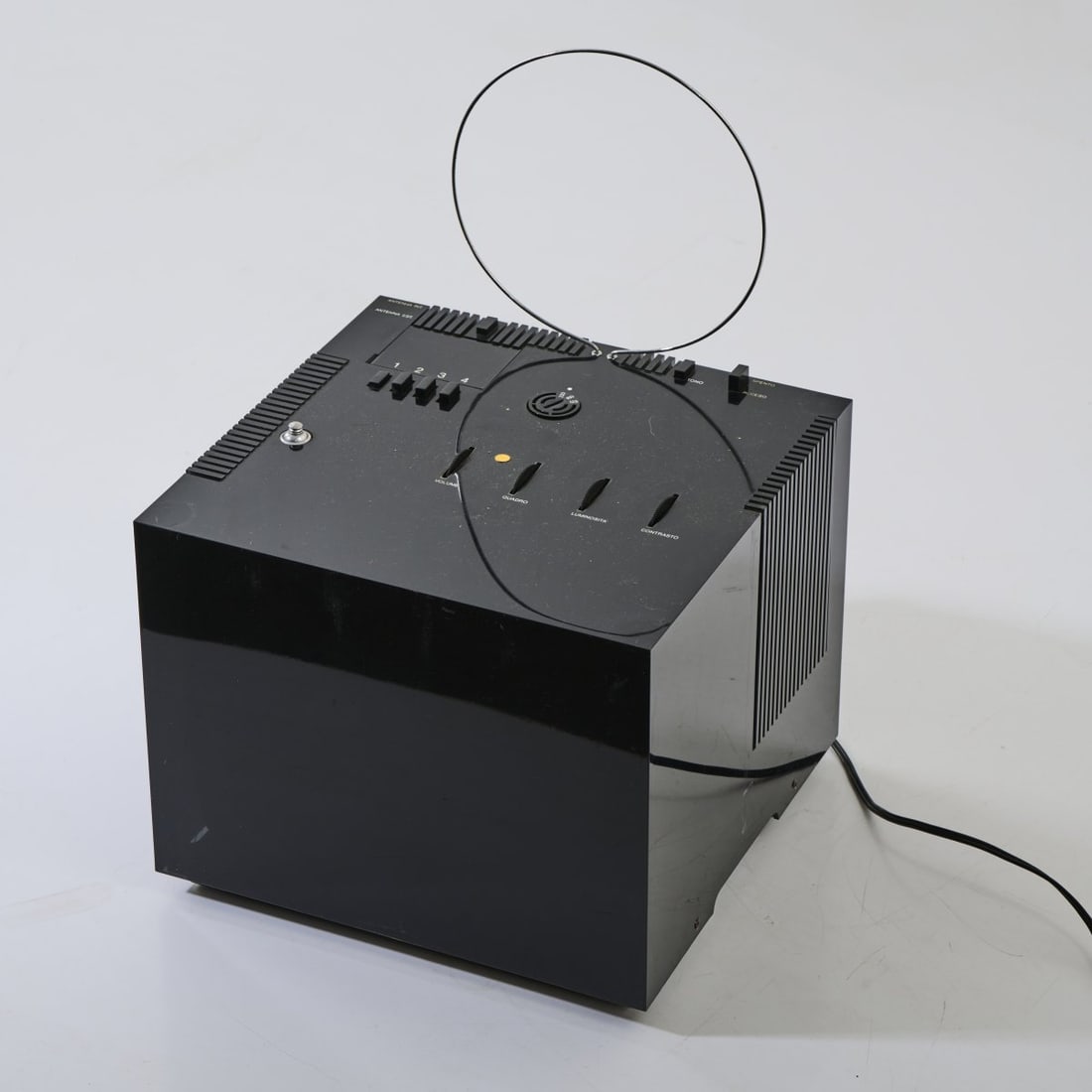 Richard Sapper; Marco Zanuso, Two television sets 'Black st201', 1969, and 'Cube 15', 1992: Black st 201: H. 27 x 31 x 29.5 cm; Cube: H. 36 x 38 x 38 cm. Made by Brionvega, Milan. Black plastic, glass, white plastic. Marked: BRIONVEGA Black st 201. Literature: Albini/Rosetti, Il design di b