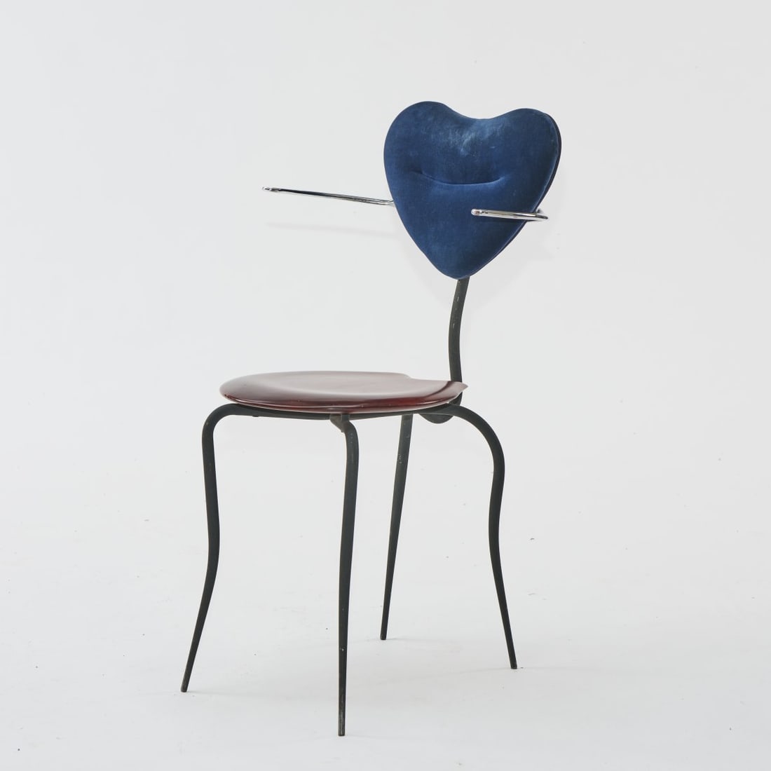 Roberto Lazzeroni, Armchair 'Little Sister', 1992: H. 86.5 x 48 x 54 cm. Made by Cidue srl., Atripalda. Cast aluminum, polished, aluminum tube, coated dark gray, wood stained to mahogany, textile cover, dark blue. Marked: manufacturer's sticker.