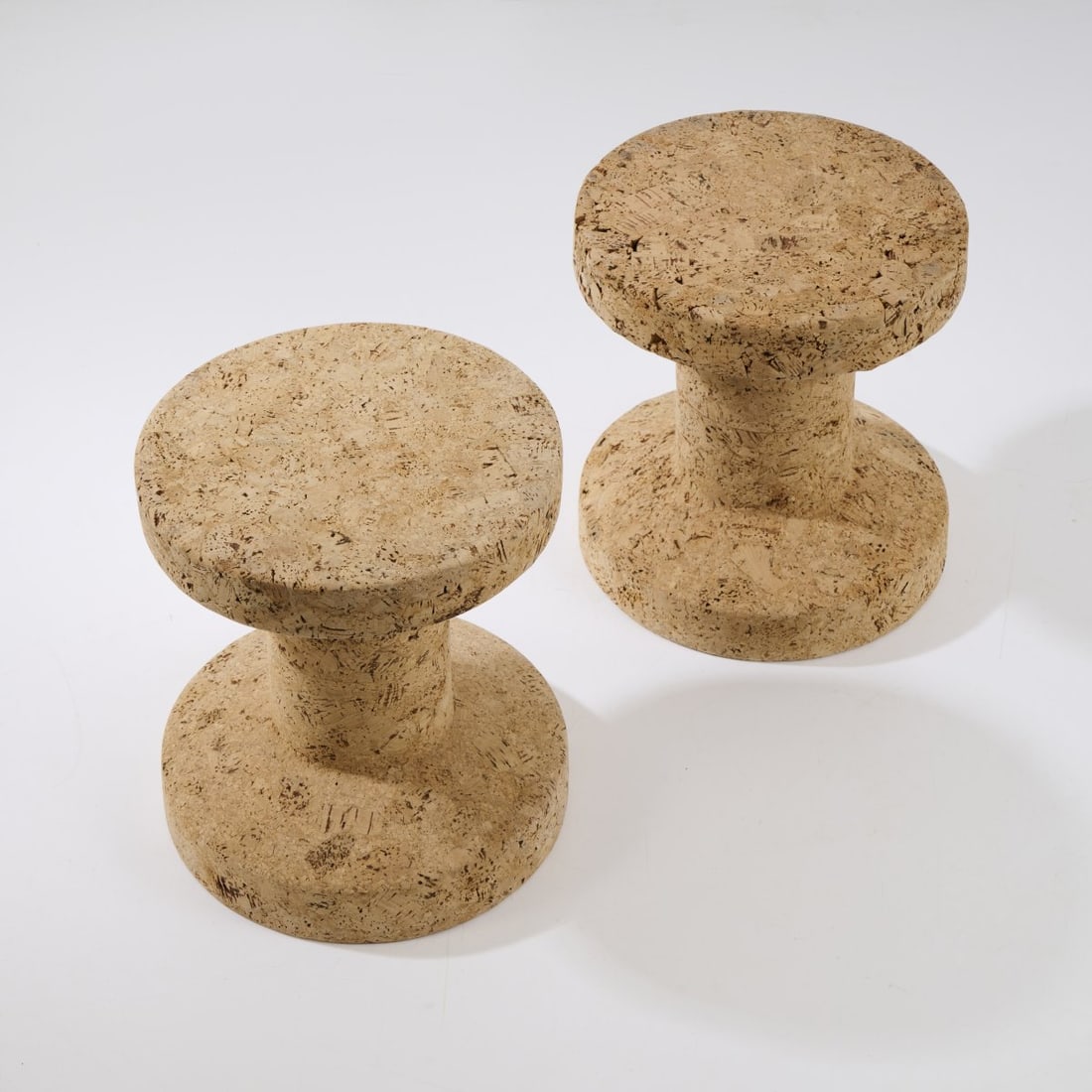 Jasper Morrison, Two 'Cork B' stools, 2004: H. 33 cm, Ø 30.5 cm. Made by Vitra, Birsfelden. Cork. Literature: Morrison, Jasper Morrison. Everything but the Walls, Baden 2002/2006, p. 212.