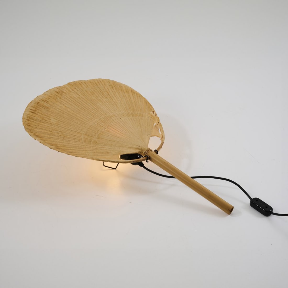 Ingo Maurer, 'Uchiwa IV' wall light, 1973: H. 63 x 43 cm. Made by Design M Ingo Maurer, Munich. Bamboo cane, rice paper, metal rods, painted black. Literature: Bauer (ed.), Ingo Maurer. Making Light, Munich 1992, p. 249; Company catalogue Des