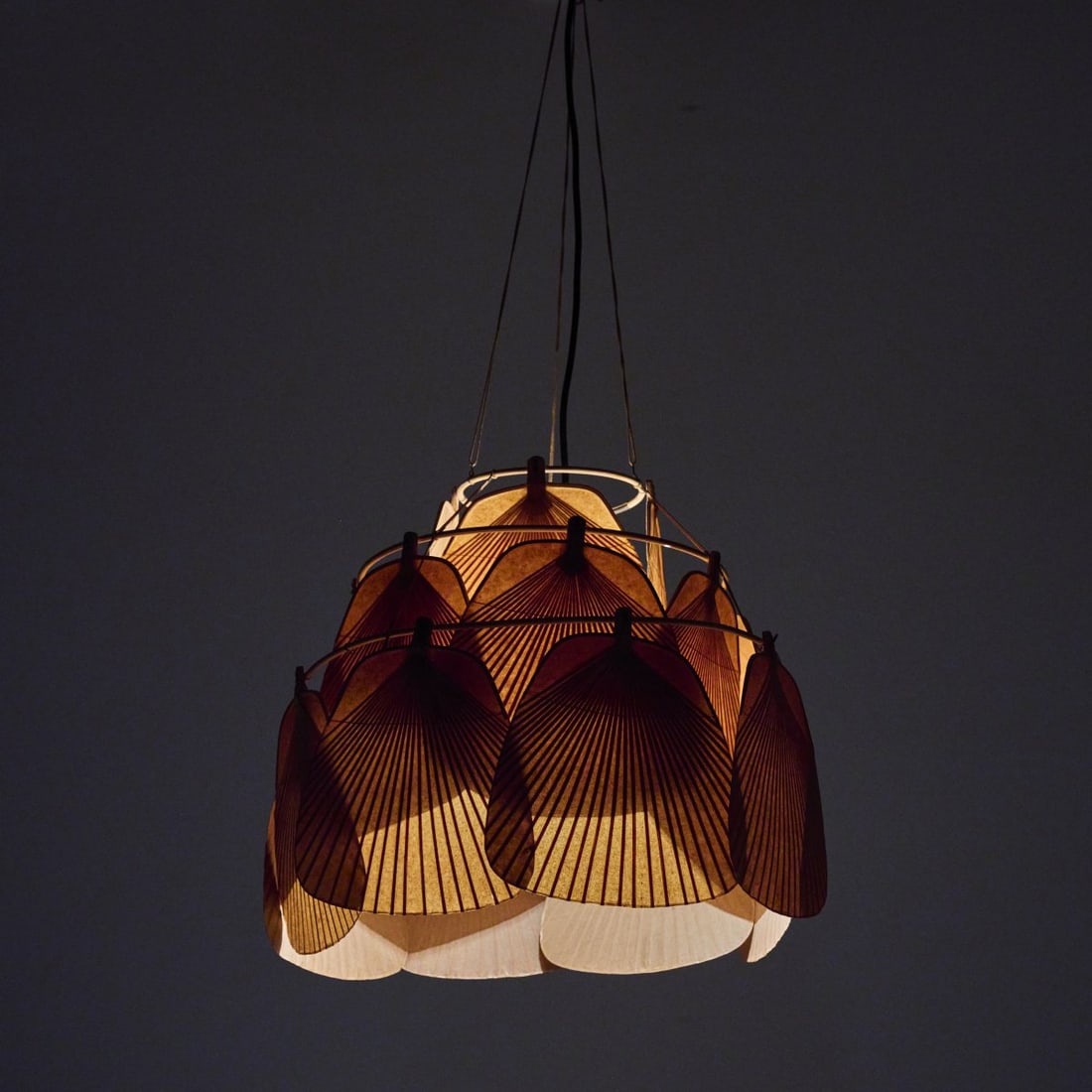 Ingo Maurer, 'Ju-Ku' ceiling light from the 'Uchiwa' series, 1973: H. 46 cm (without suspension), Ø 45 cm. Made by Design M, Ingo Maurer, Munich. Bamboo cane, rice paper, cotton, brass. Literature: Bauer (ed.), Ingo Maurer. Making Light, Munich 1992, p. 28, p