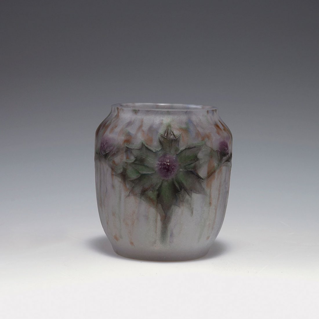 'Chardons' vase, 1915: Gabriel Argy-Rousseau, Paris. 'Chardons' vase, 1915. H. 9.8 cm. Pate de verre, translucid gather, moulded, powder fusions, purple, brown and green. Reliefed pattern with thistles. Marked: G. Argy-Rous