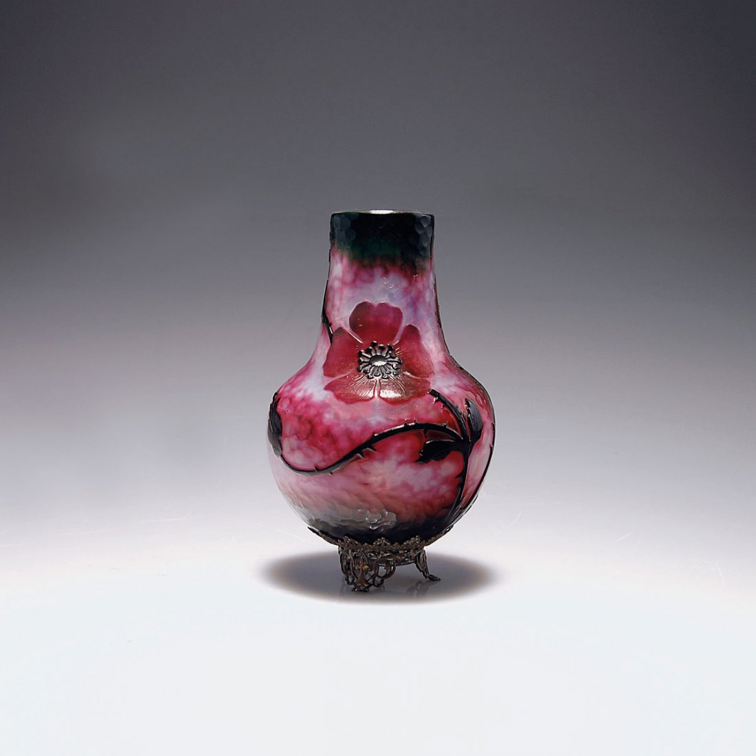 Martele vase 'Eglantine', c1898: Daum Freres, Nancy. Martele vase 'Eglantine', c1898. H. 14 cm. Cased glass, milky opalescent, clear, wine red and green. Multiply etched pattern with dog roses, ground with Martele cut. Signed: DAUM N