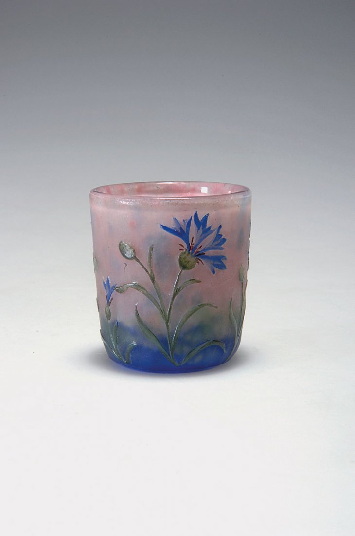 'Bleuet' miniature vase, c1905: Daum Freres, Nancy. 'Bleuets' miniature vase, c1905. H. 4.1 cm. Cased glass, clear, pink, green and deep blue powder inclusions. Etched and polychromatic enamelled pattern. Signed: DAUM NANCY, cross o
