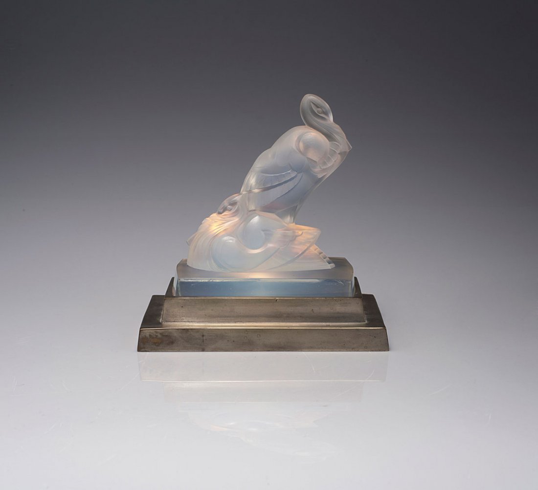 'Pelicans' table light, c1930: Marius-Ernest Sabino, Paris. 'Pelicans' table light, c1930. H. 19.7 cm; 19.8 x 11.8 cm. Clear, opalescent glass, bronze base.