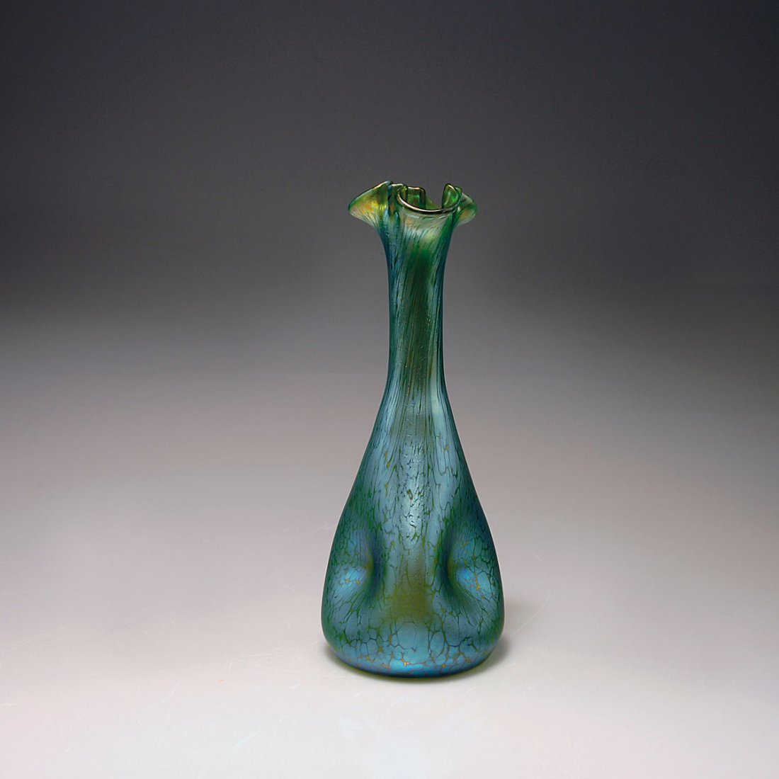 'Papillon' vase, 1900: Loetz, Klostermuhle. 'Papillon' vase, 1900. H. 24.23 cm. Green glass, fused silver yellow crushed glass, creta Papillon, green and mother-of-pearl lustre.