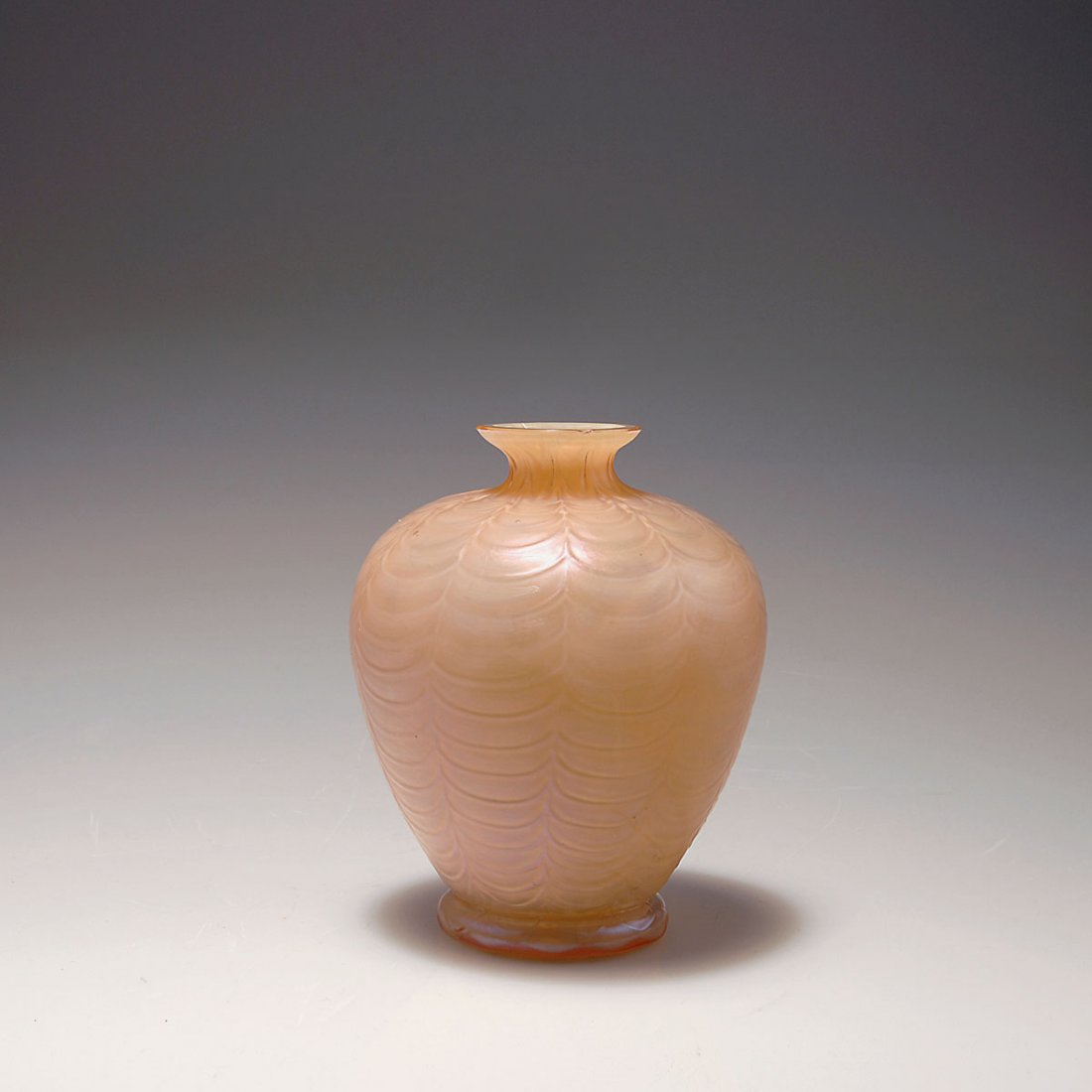 Vase, 1900-10: Franz Welz, Antonienhutte, Klostergrab. Vase, 1900-10. H. 14.2 cm. Cased glass, clear, milky white and salmon pink, wave pattern, matt mother-of-pearl lustre.