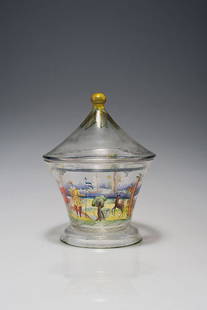 Covered jar, 1917: Wiener Werkstatte. Covered jar, 1917. H. 19.3 cm; D. 14.5 cm. Pattern designed by Hilda Jesser, shape by Josef Hoffmann. Made by Richard Oertel, Haida. Bubbly clear glass, polychromatic enamel with fi