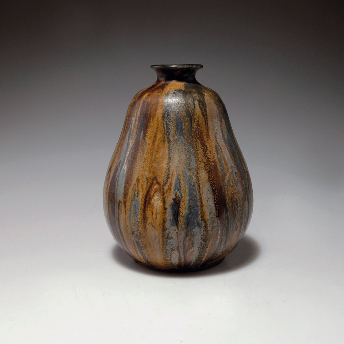 Vase, c1925: Roger Guerin, Bouffioulx. Vase, c1925. H. 19.6 cm. Light brown stoneware, matt running glaze in brown and green with blue. Marked: 32 C, Guerin.