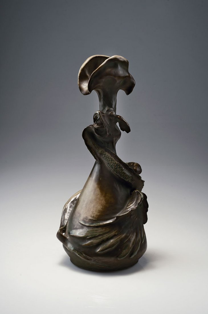 Vase with dragon, 1900/01: Amphora-Werke Riessner, Stellmacher & Kessel, Turn-Teplitz. Vase with dragon, 1900/01. H. 34.6 cm. Designed by Eduard Stellmacher. Earthenware, glazed metallic-brown on light brown, green scales.