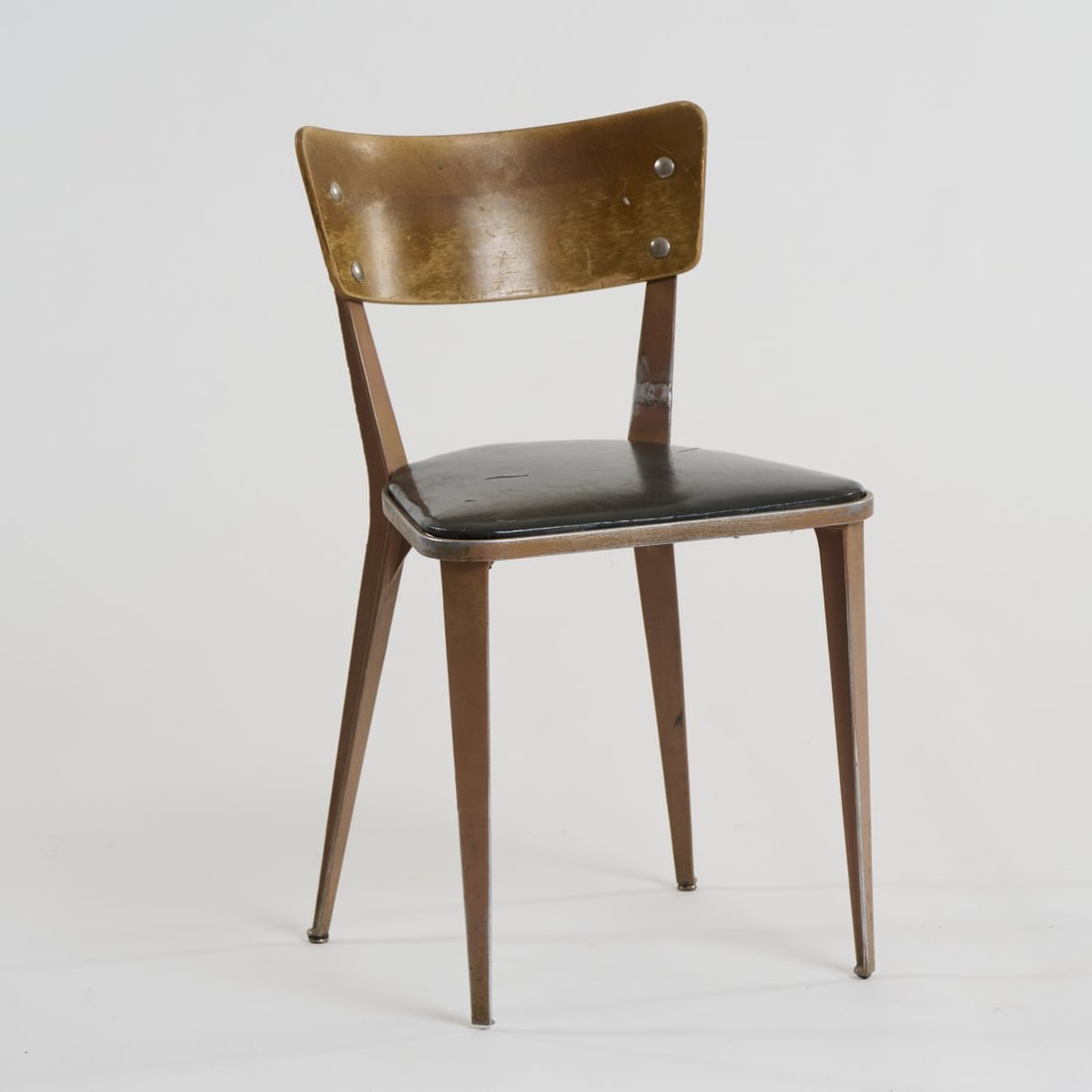 Ernest Race, 'BA Chair', 1945 (design): H. 76 x 44 x 46 cm.jg Furniture Co., New York. Sectional aluminum, painted brown, plywood, black vinyl covering. Marked: manufacturer's embossing, manufacturer's label.