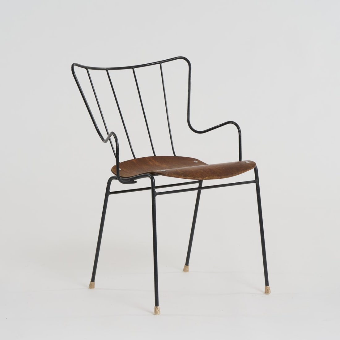Ernest Race, 'Antelope Chair', 1951 (design): H. 80.5 x 54 x 57.5 cm. Race Ltd., London. Tubular metal, painted black, plywood with beech veneer, stained dark. Marked: Manufacturer's sticker. Literature: Fiell, 50s Decorative Art, Cologne 2000,