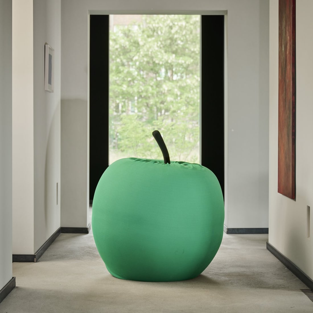 Studio 65, 'The Big Apple', 1974 (design): H. 85 cm, Ø 90 cm. Gufram, Milan. Polyurethane foam, green and black textile fabric.
