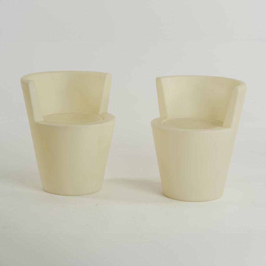 Tom Dixon, Two 'Tube Chairs', 2004 (design): H. 63 cm, Ø 57 cm. Cappellini, Milan.Plastic, white. Marked: manufacturer's stamp.