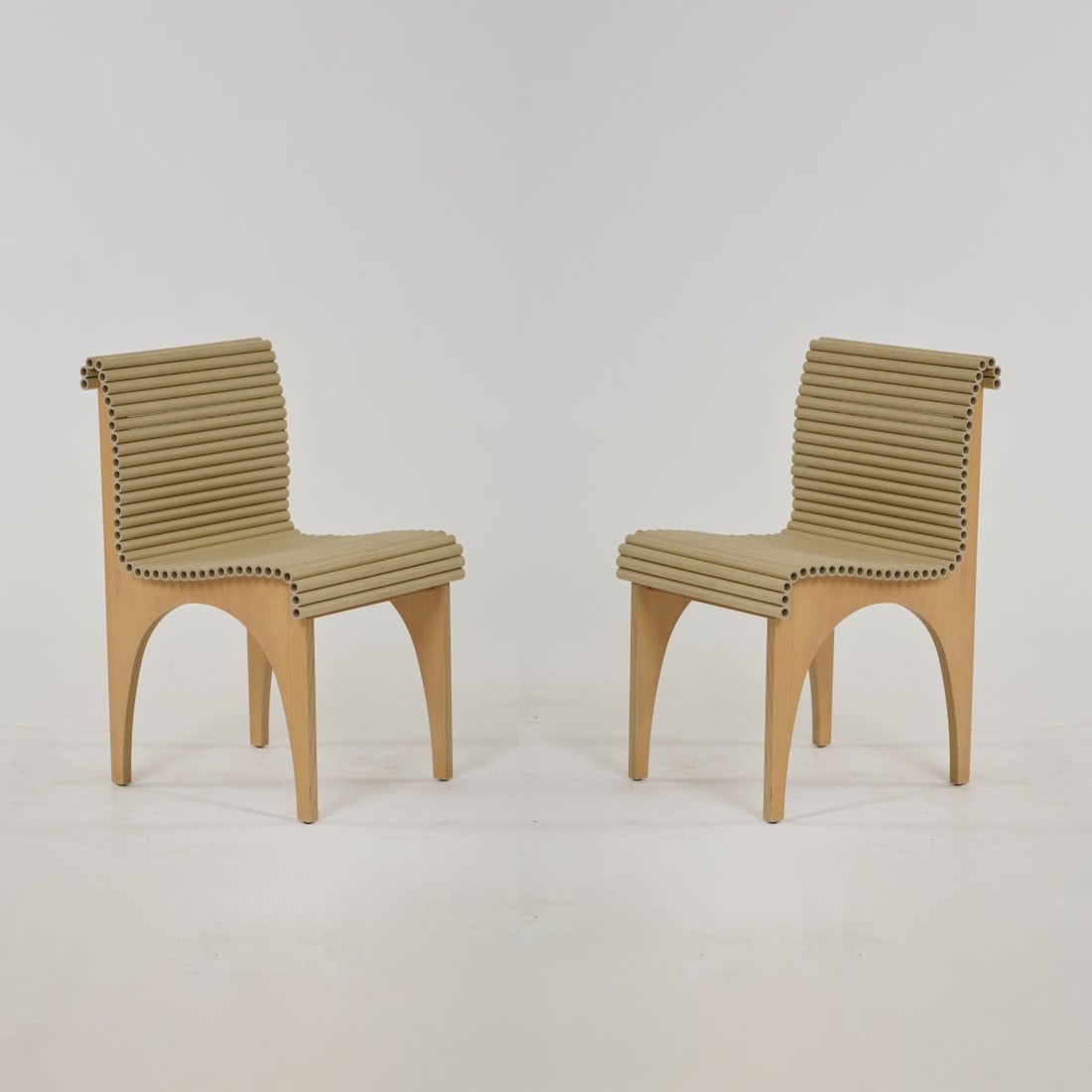 Shigeru Ban, Two 'Carta' chairs, 1998 (design): H. 77 x 44 x 50 cm. Cappellini, Milan.Beech plywood, cardboard tubes. Literature: Cat. Cappellini 2001, p. 61.