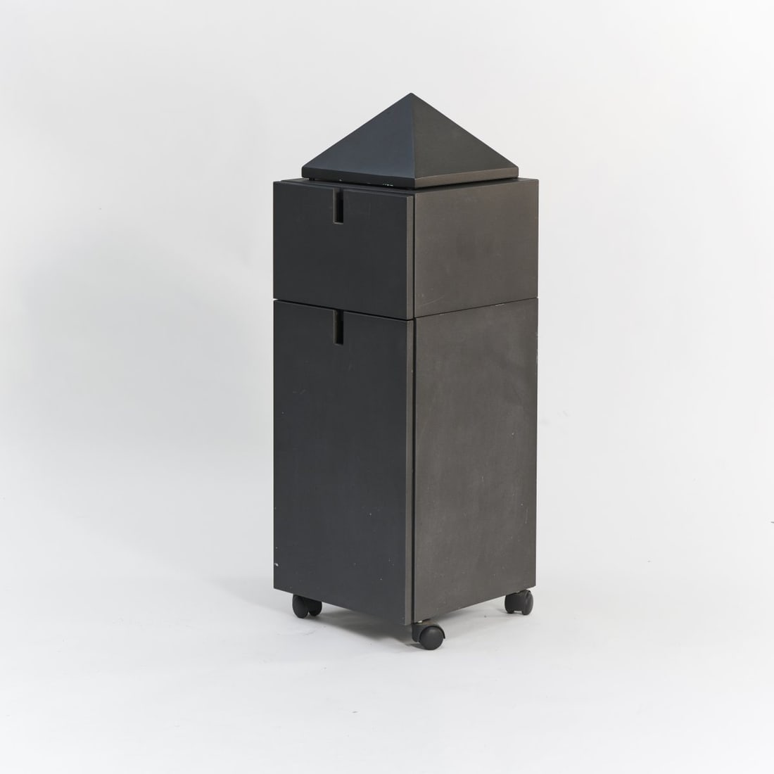 Philippe Starck, 'Theatre du Monde' cabinet, 1984 (design): H. 113 x 38.5 x 41 cm. XO, Brie-Comte-Robert. Sheet metal, painted black, casters. Literature: Philippi (ed.), STARCK, Cologne 2000, p. 218.