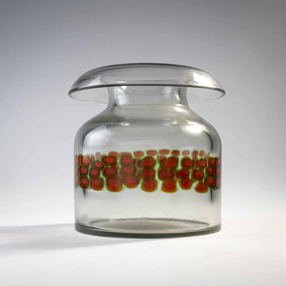 Antonio Da Ros, 'Murrine' vase, c. 1969: H. 20.5 cm. Execution: Gino Cenedese. Cased glass, colorless and gray with three rows of murrine ribbons in green and red.
