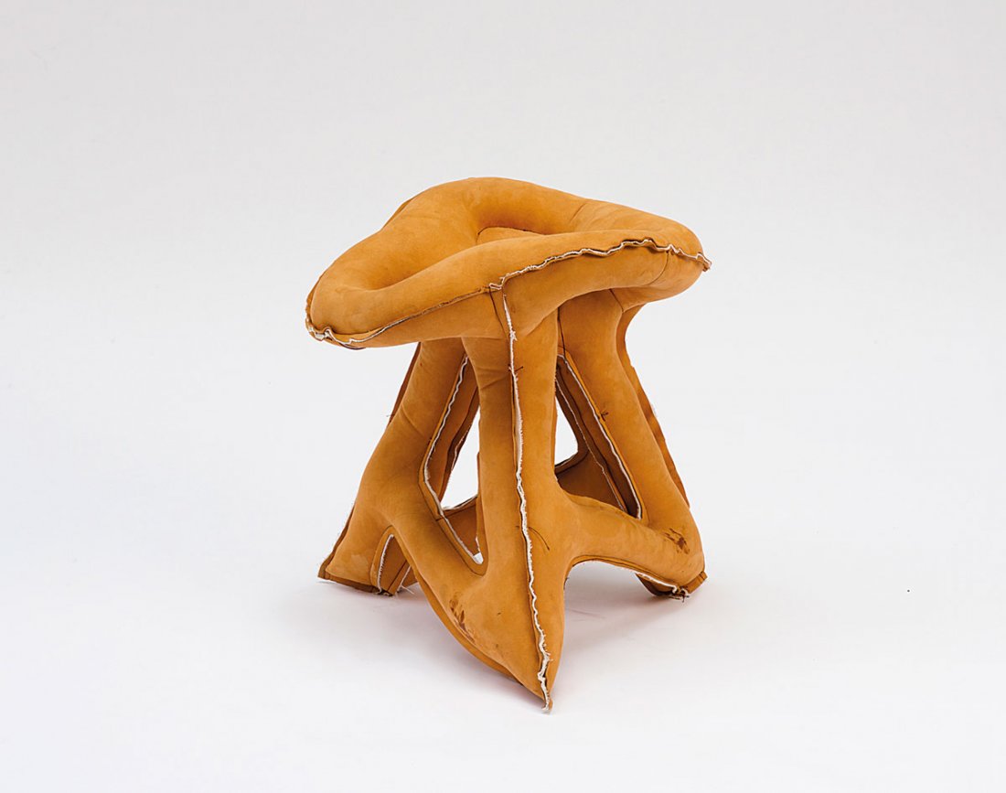 Prototype stool 'Soft Concrete' c2010: Tejo Remy; RenŽ Veenhuizen. Prototype stool 'Soft Concrete', c2010. H. 51.5 x 48 x 40 cm. Made by Remy/Veenhuizen, Rotterdam. Orange brown alcantara cover filled with PE foam ('soft moulding').
